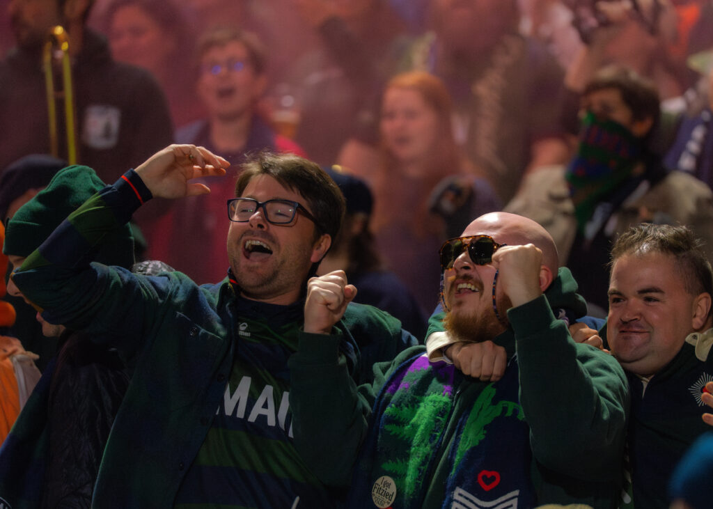 People cheering at  Hearts of Pine game. Photo Credit: Avery Lehman