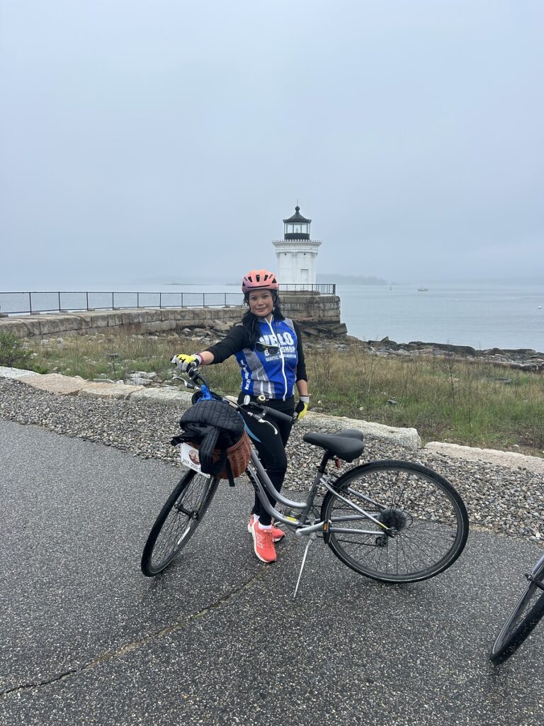 Biker at Lighthouse. Photo Credit: Leah Day