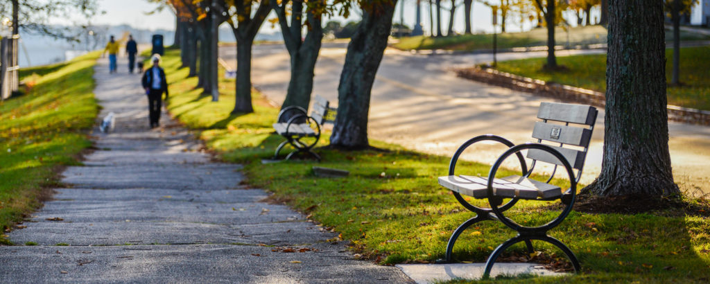 Eastern Promenade with Trail and People Walking with Bench, Photo Credit: Corey Templeton